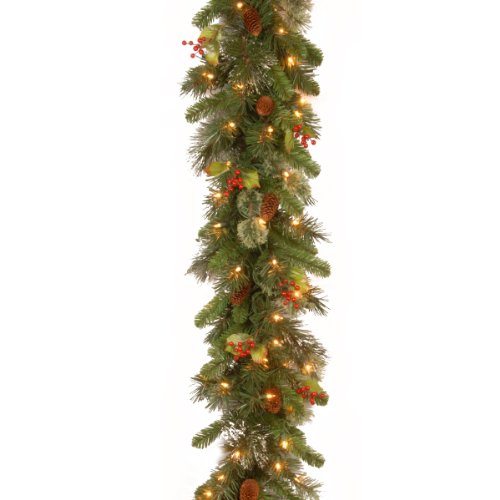 9' x 12 Wintry Pine Garland with Cones, Red berries, Snowflakes and 100 clear lights